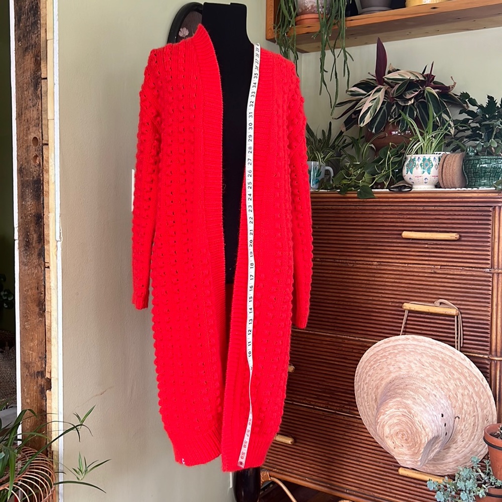 Long red open front cardigan size XS by Lego.